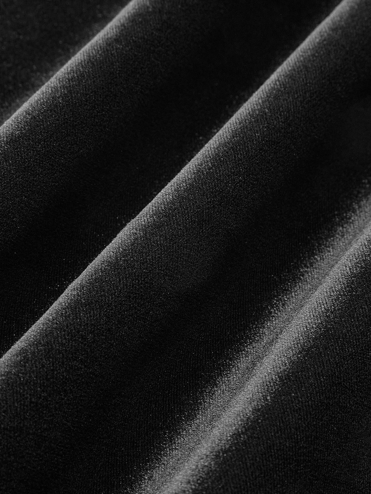 Katrina | Fluwelen minijurk met diepe rugdecolleté en grote strik